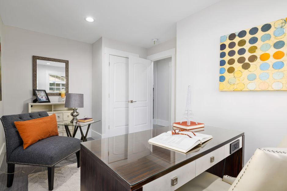 Bright modern home office with stylish furniture and decor, perfect for work-from-home setup.